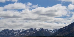 landscape-photo-of-mountain-under-blue-cloudy-sky-192993