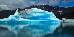 scenic-view-of-frozen-lake-against-blue-sky-314839